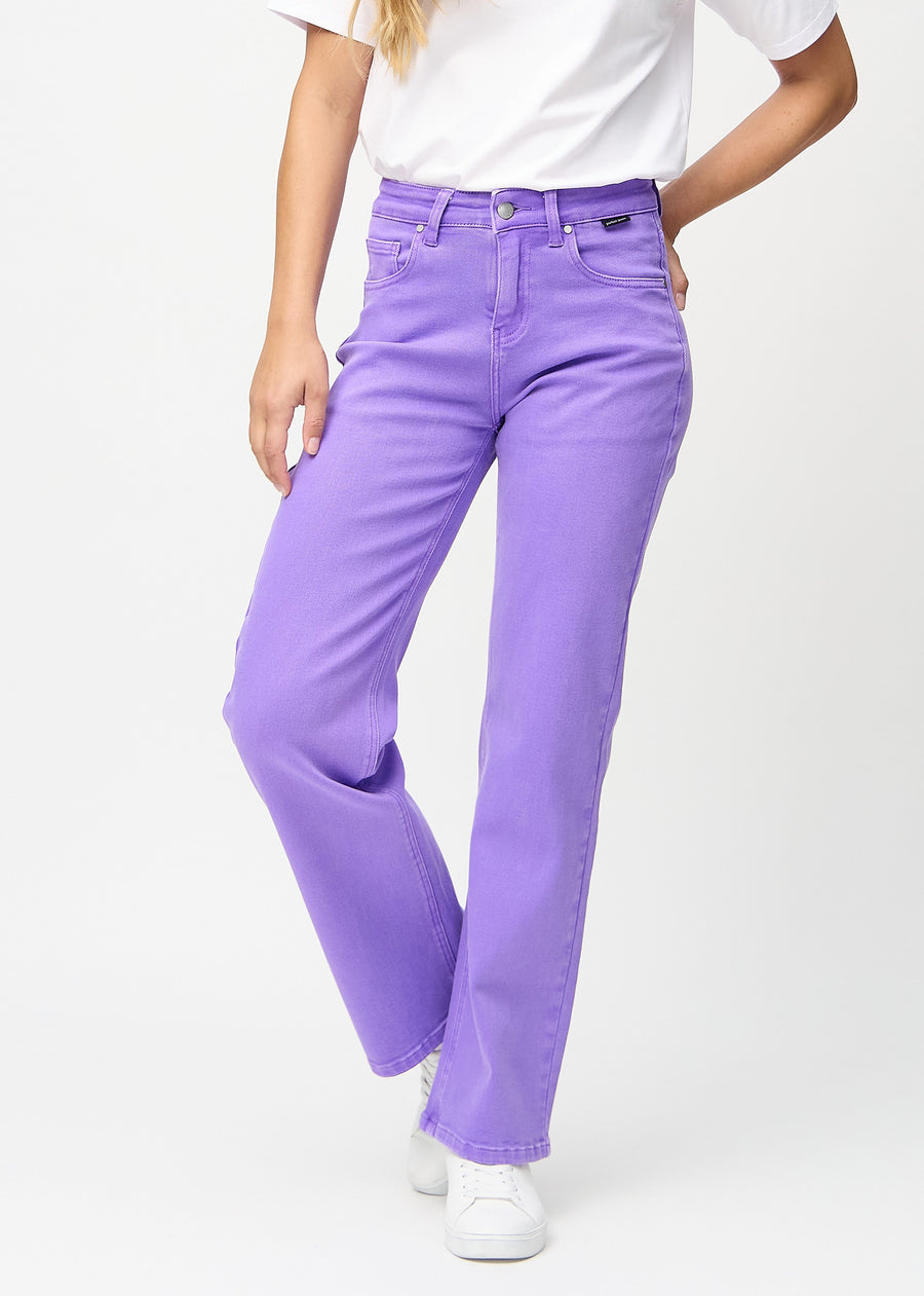 Purple loose jeans, model name Lavenders, which is loose-fitting with plenty of width in the legs, seen from the front.

