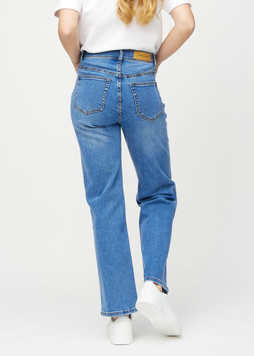 Denim loose jeans seen from the back, so the entire product can be seen.