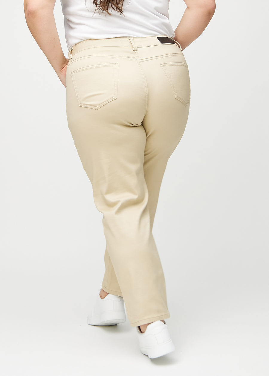 Beige regular jeans seen from the back on a plus-size model, so the entire product can be seen.