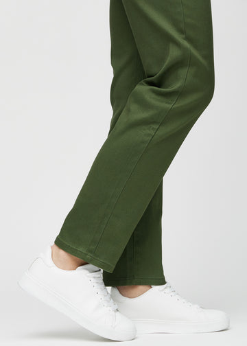 Regular jeans for women in dark green, color Renewals. Close-up at the ankles on a model, showing the straight leg openings.
