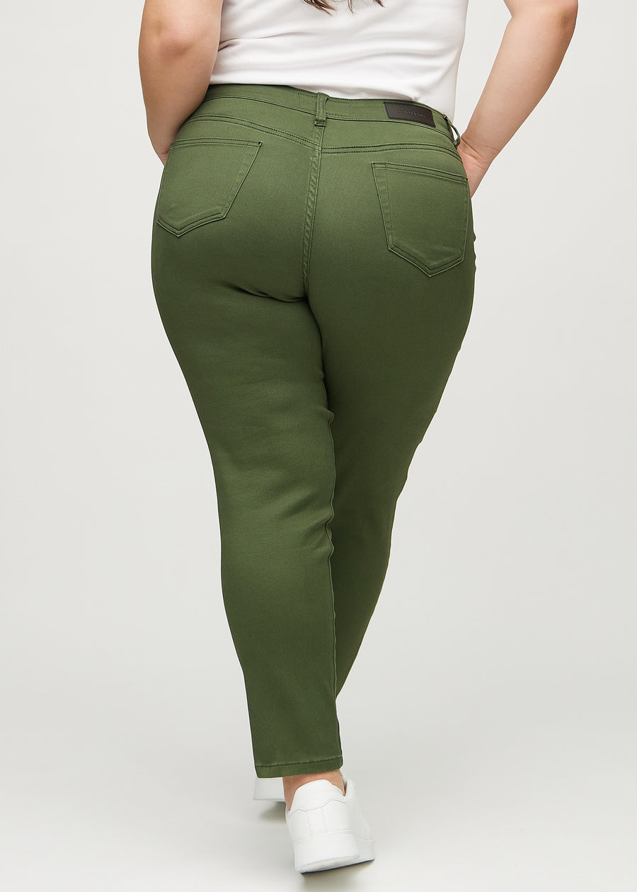 Slim jeans for women in dark green, color Renewals. Back view on a plus-size model, showing the overall fit.