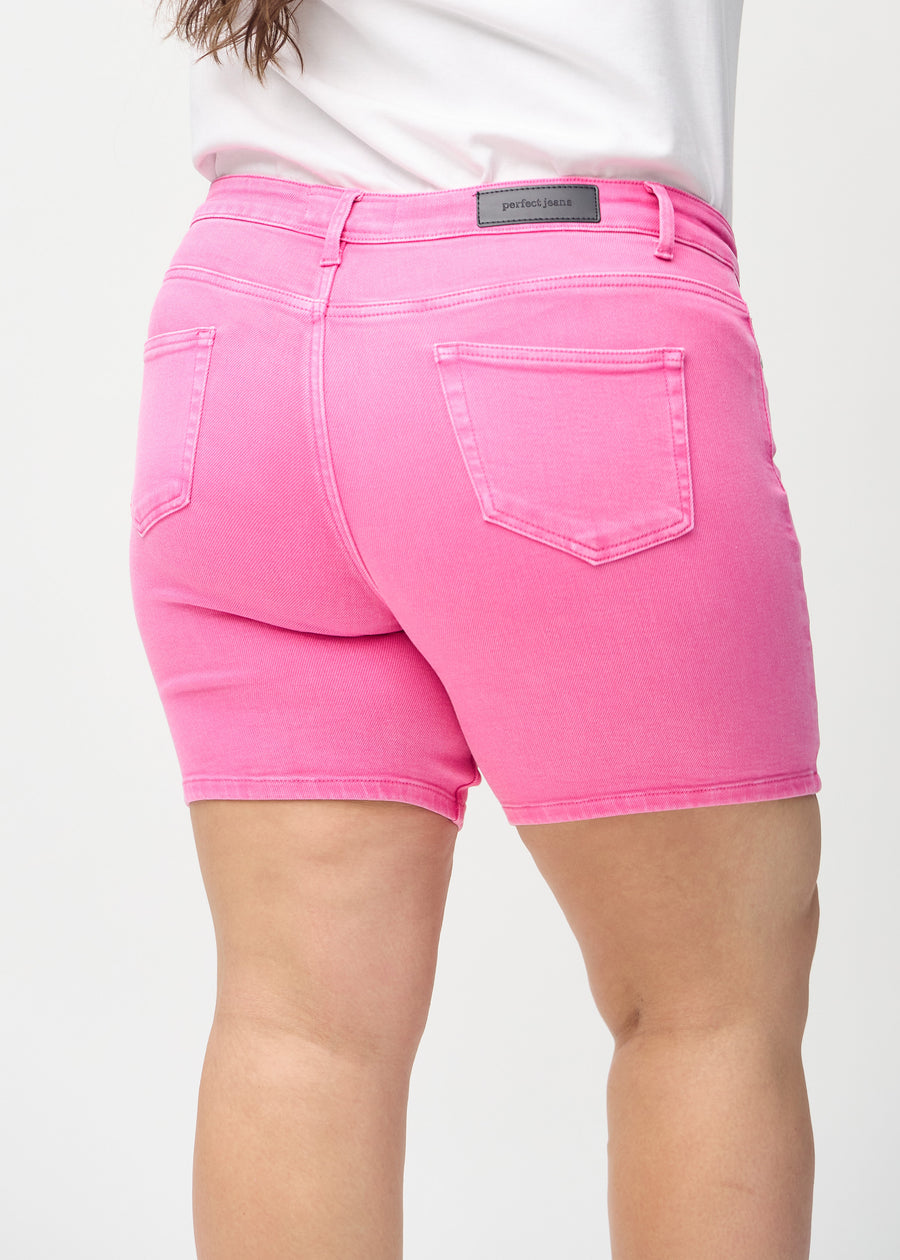 Light pink skinny short shorts seen from the back up close on a plus-size model to show details.
