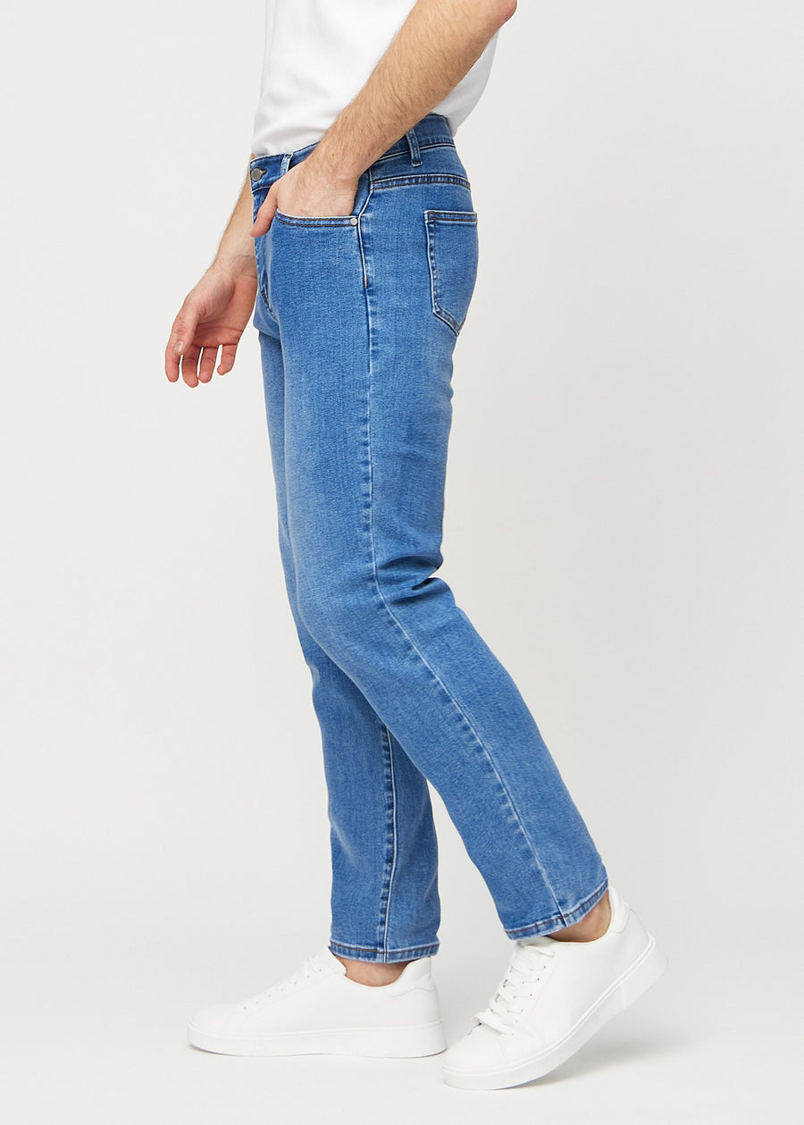 Denim regular jeans seen from the side on a model.