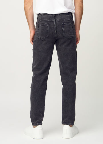 Dark grey denim regular jeans viewed from the back, so the entire product can be seen.