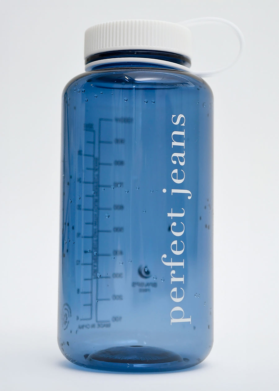 Transparent dark blue plastic water bottle with a white lid and logo.
